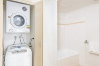 The Brighton Toronto 1 and 2 Bedroom Apartment Laundry and Bathroom with Bath